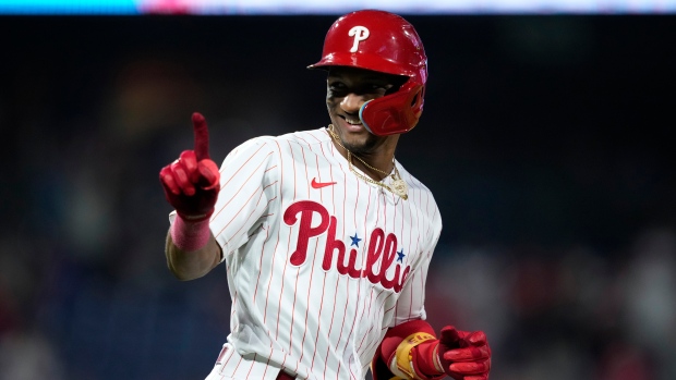 Stott, Realmuto, Rojas homer for NL wild card-leading Phillies in 13-2 win  over Twins