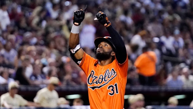 Baltimore Orioles' Cedric Mullins pauses at first base after hitting a  single against the Arizona Diamondbacks during the ninth inning of a  baseball game Friday, Sept. 1, 2023, in Phoenix. The Diamondbacks