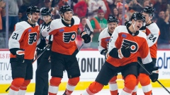 Couturier scores on penalty shot, Hart makes 25 saves to help Flyers beat  Canucks 2-0, National Sports