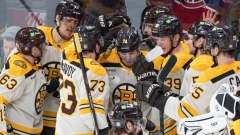 Jake DeBrusk and Bruins celebrate