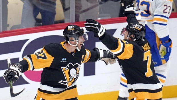 Penguins' stars reach career milestones in OT win over Sabres Article Image 0