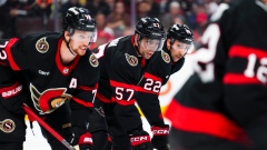 Thomas Chabot, David Perron and Michael Amadio