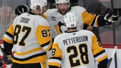 Rust scores hat trick, Penguins strike six times in third to win 9-2 over Canadiens Article Image 0