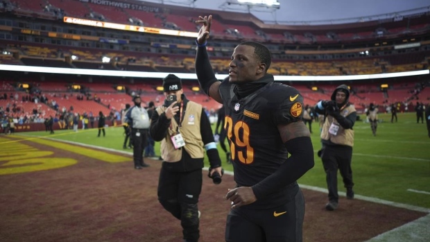 Jeremy Reaves gets engaged after the Washington Commanders clinch a playoff spot Article Image 0