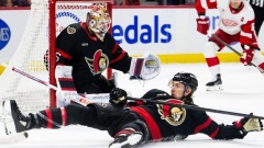 Jake Sanderson blocks a shot