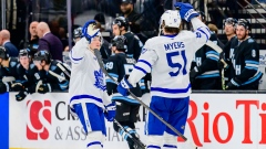 Mitch Marner celebrates with Philippe Myers