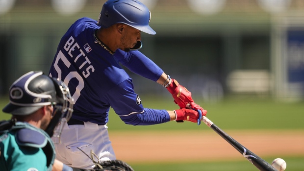 Dodgers' Betts dealing with illness in Japan, Roberts hopeful he'll be ready for opening day Article Image 0