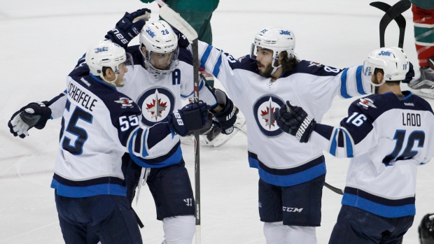 Winnipeg Jets beat Minnesota Wild for franchise's first playoff win