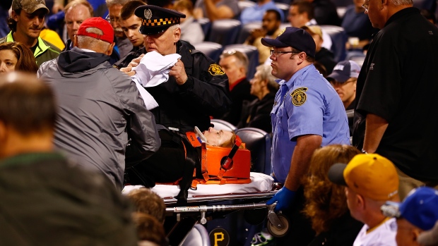 Fan hospitalized after being struck in head by foul ball at Rangers game