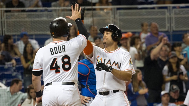 Marlins' Giancarlo Stanton cleared to swing bat