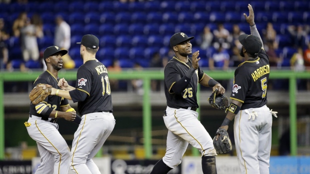 Francisco Cervelli of the Pittsburgh Pirates scores ahead of the