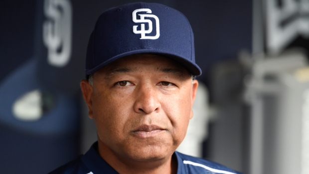 Manager Dave Roberts of the Los Angeles Dodgers argues with home News  Photo - Getty Images