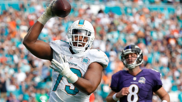 Dolphins use turnovers to defeat Ravens 