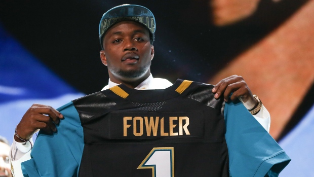 Jacksonville, FL, USA. 16th Sep, 2018. Jacksonville Jaguars defensive end  Dante Fowler (56) runs unto the field before the start 1st half NFL  football game between the New England Patriots and the