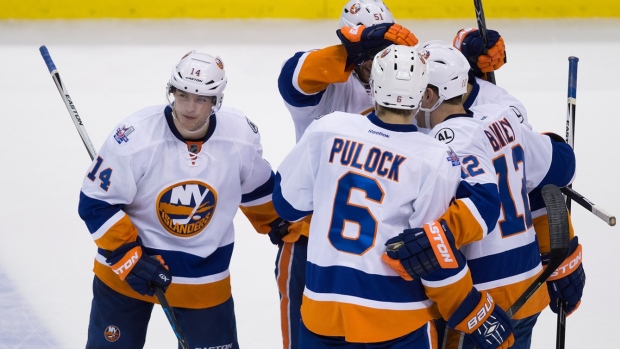 Islanders players celebrate