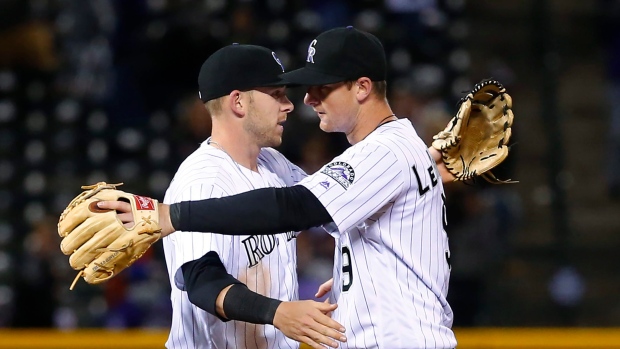LeMahieu, Wolters lead Rockies over Mets 
