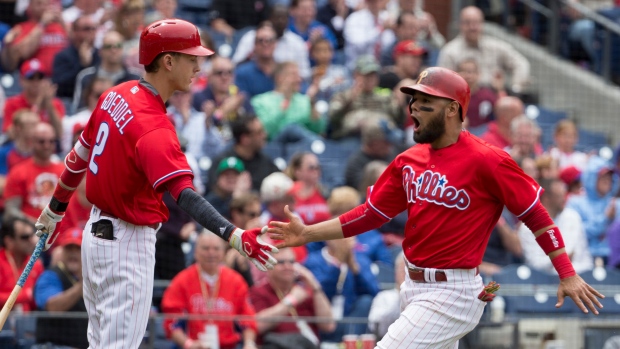 Howard homers, drives in four as Phillies end six-game skid