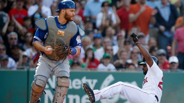 Boston Red Sox David Ortiz smiles on 3rd base with Mookie Betts