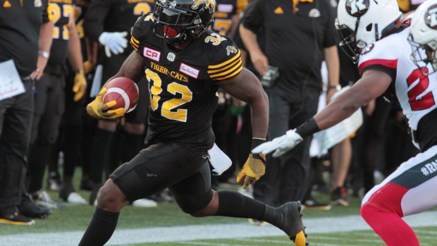 Hamilton Tiger-Cats running back indicates retirement; club now says he's  been let go