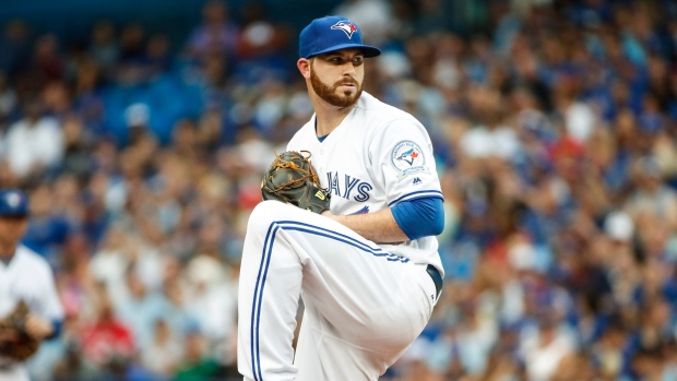 Toronto Blue Jays Darwin Barney struggles sliding into third base