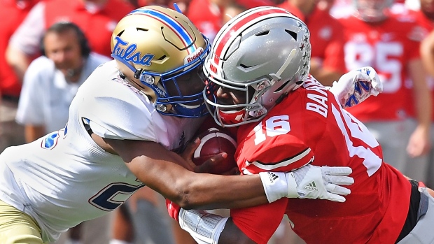 Jeremy Brady, left, and  J.T. Barrett