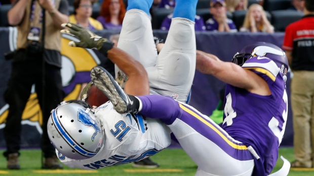 Tate's TD in OT lifts Lions over Vikings, 22-16