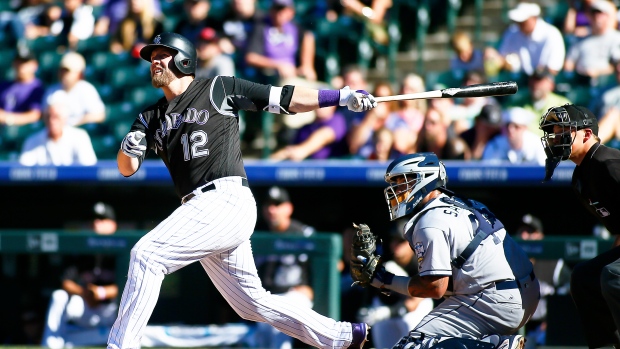 MLB report: Rockies' Ian Desmond breaks left hand when he's hit by