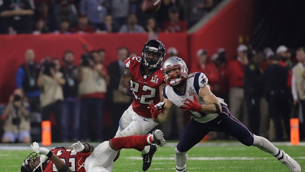 New England Patriots wide receiver Julian Edelman makes a diving