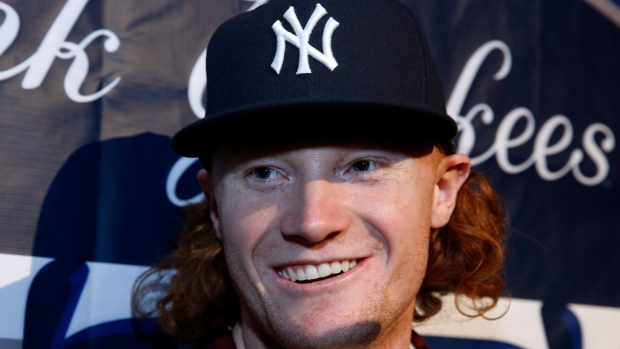 Yankees' Clint Frazier cuts flowing locks of red hair