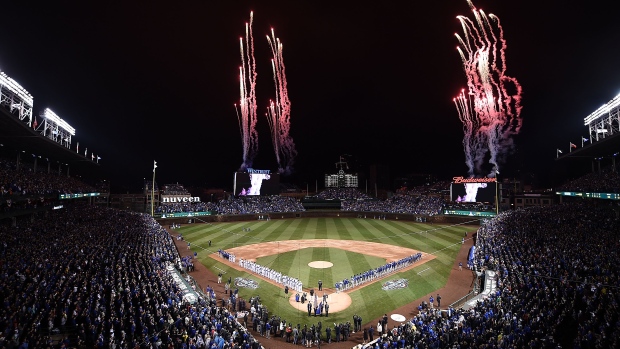 Banner moment: Chicago Cubs finally raise championship flag