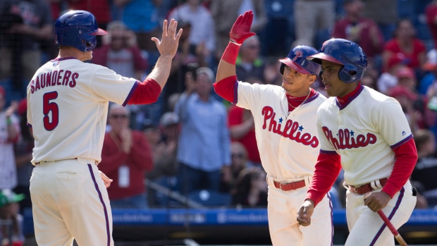 Phillies hit 3 straight homers, beat Braves 5-2 for sweep