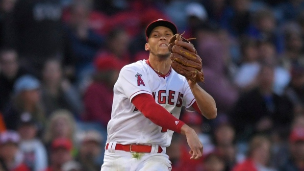 Los Angeles Angels' Andrelton Simmons (2) throws his arm around