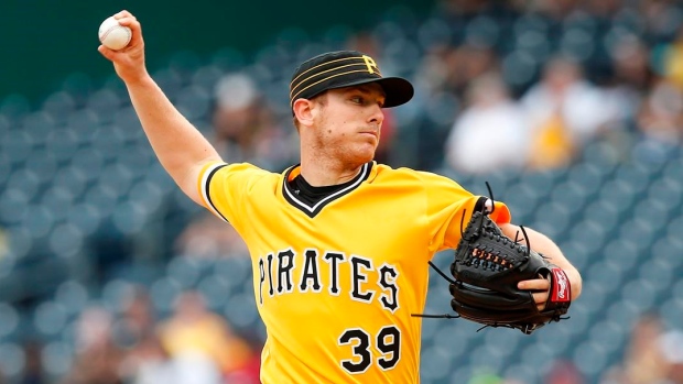 Pirates edge Phillies in rain after Freese HBP 