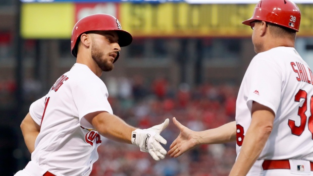 Pujols, Arenado homer as Cardinals beat Rockies 9-5