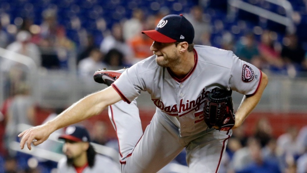 Washington Nationals' Max Scherzer hits first career homer, then leaves game