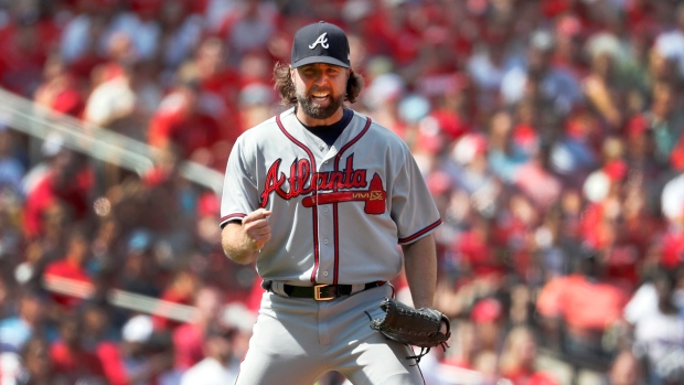 Dickey helps Braves win 6-3, stops Cards' 8-game win streak