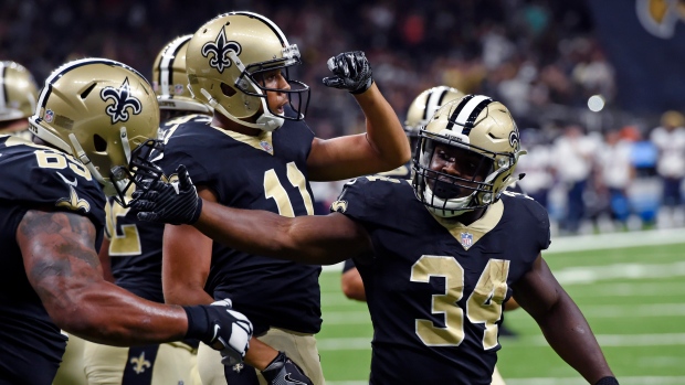 Brees shines as Saints hand Texans first loss