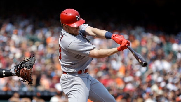 Cards power past Giants on homers by Bader, DeJong, Martinez