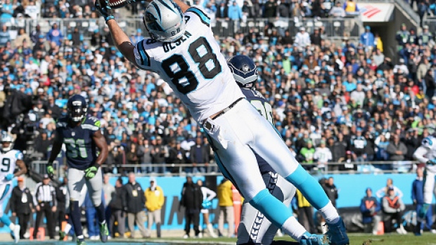 AP source: Greg Olsen signs 2-year contract extension with