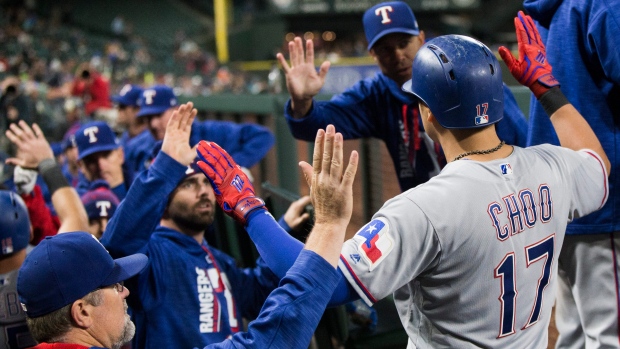 Texas Rangers' Adrian Beltre follows through on a double off Miami