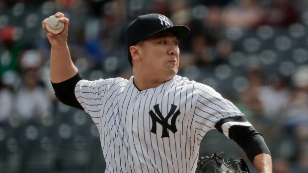 Tanaka chooses Yankees in $155 million deal