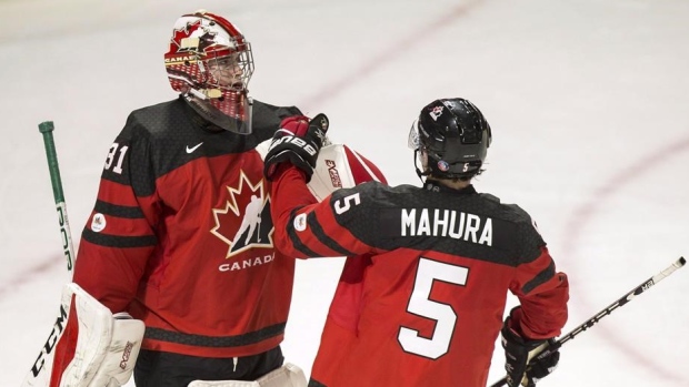 Carter Hart and Josh Mahura