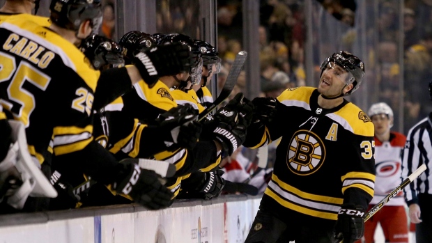 Bergeron scores in 2nd OT, Bruins beat Hurricanes in Game 1