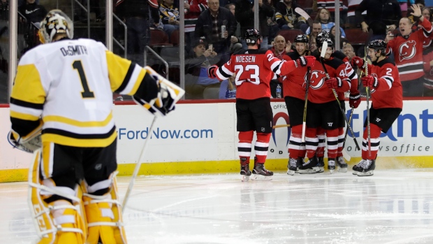 Zajac has goal, assist in Devils' win over Penguins